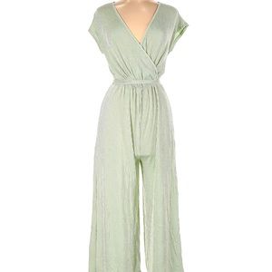 Caution to the wind. One piece jumpsuit. Soft green and white